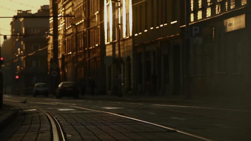 A shadow walks across the signs