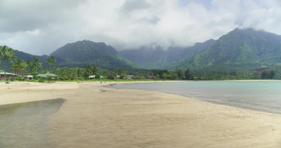 Small waves gently roll in to the beach