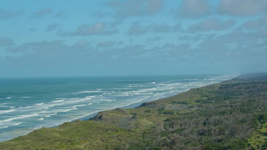 Waves flow onto the beach shore