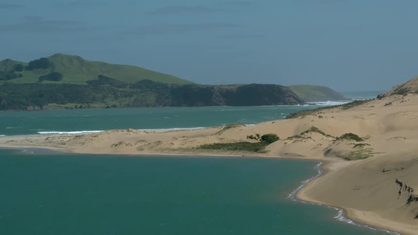 A curved empty beach