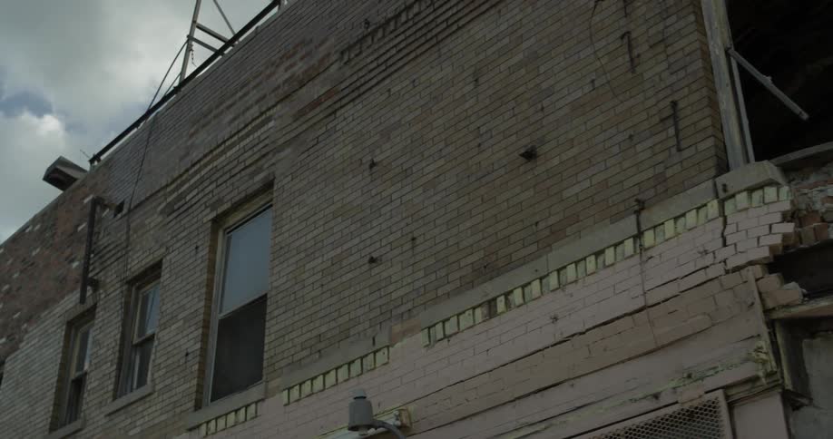 A tall building is made of brick