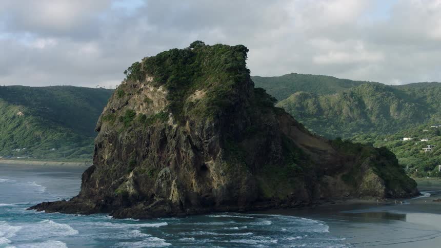 Waves flow onto the rocky shore