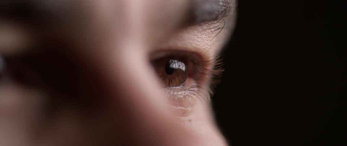 A person is looking around forward