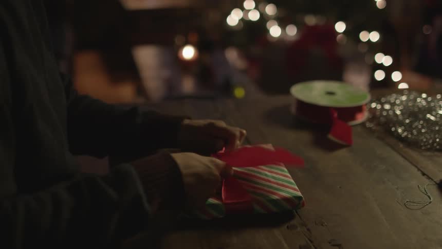 A gift is being wrapped
