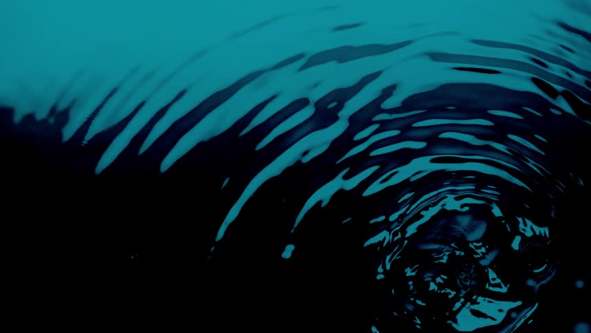 Water ripples expand outward