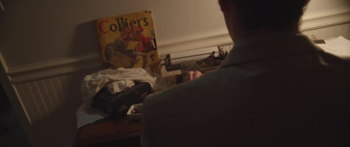 A person using a typewriter