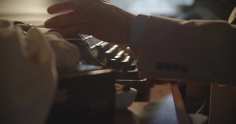 A person using a typewriter