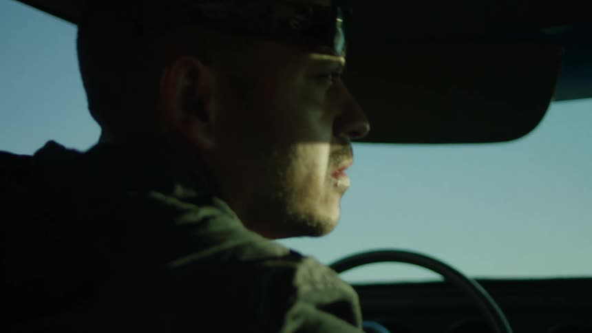 A man drives a car