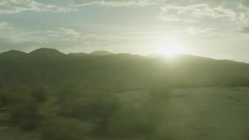 Sun shines brightly over the mountain top