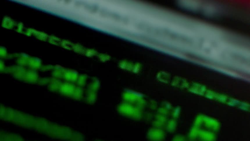 Red text is flashing on a screen