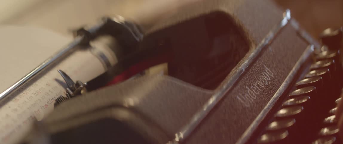 A person using a typewriter