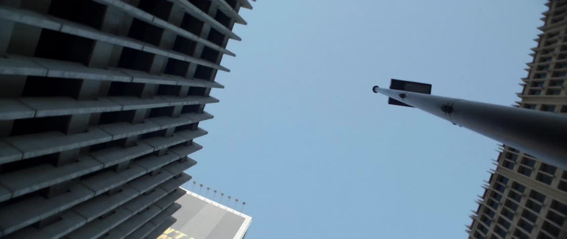 A city building towers overhead