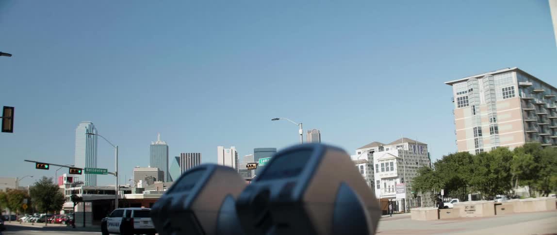 Vehicles travel on a city street