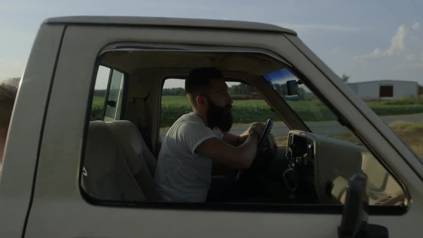 Man drives truck in the country