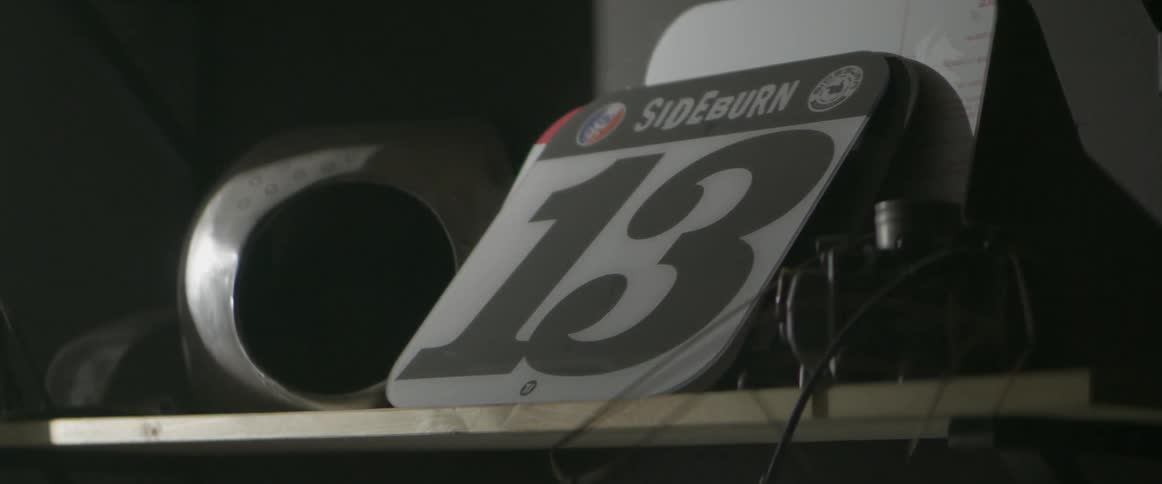A light illuminates a numerical sign