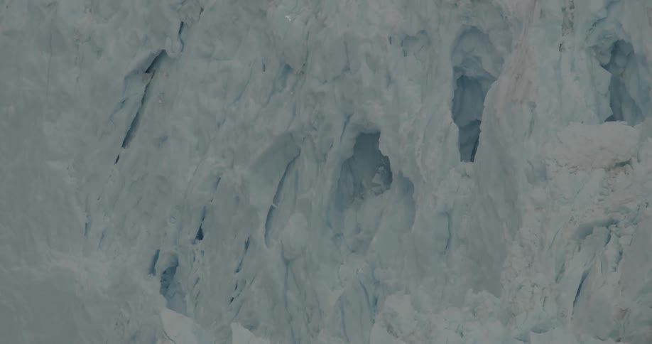 Pieces of ice falling off glacier