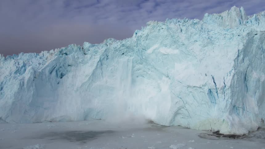 A large iceberg is melting in the water