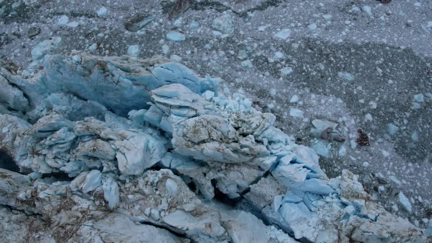 A glacier is filmed from a drone