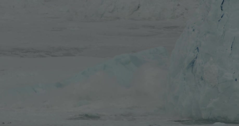 A glacier cracks and crumbles