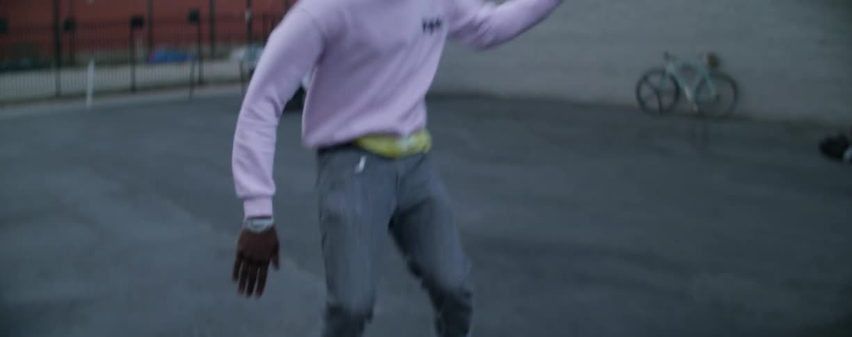 Man spins on a skateboard