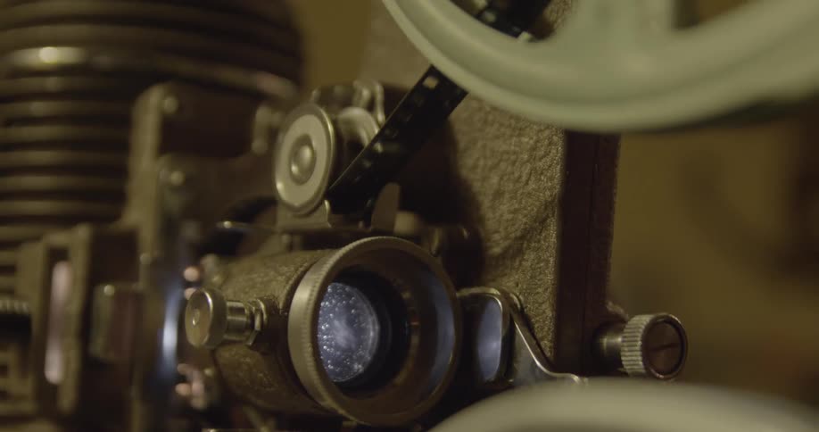 A film canister spinning on a reel