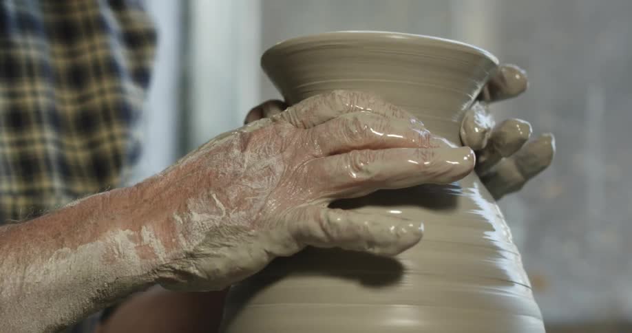 A person making pottery