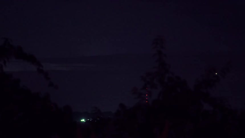 Lightning flashes in the night sky