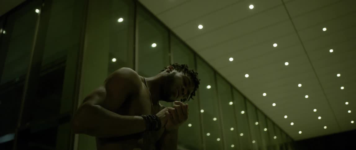Man dances alone at night