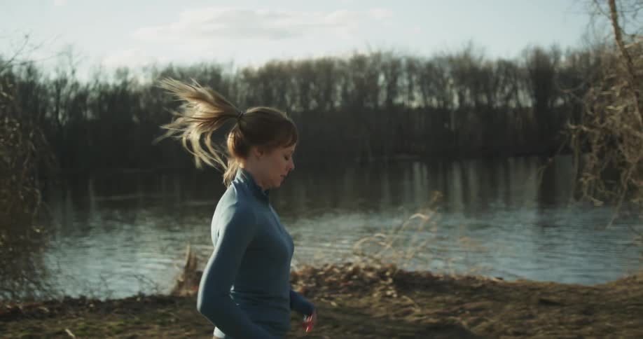 A woman is running down the road