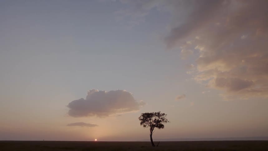 The sun is setting on the plains