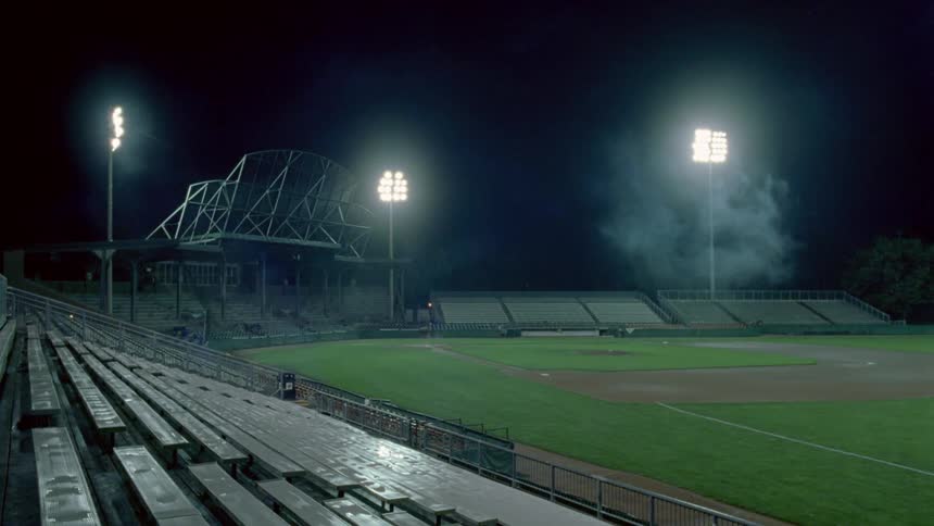 Lights illuminate baseball field at night