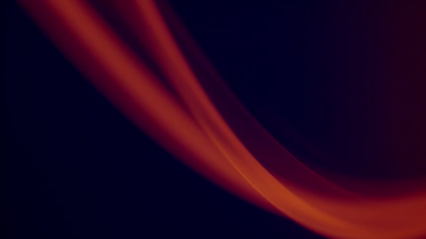 Red tubes of light on a black background