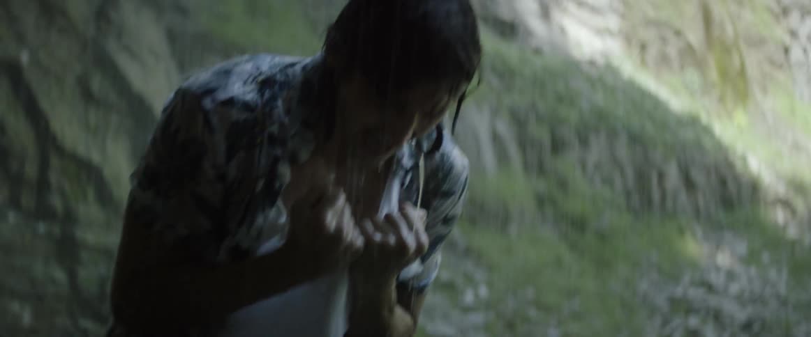 Man getting water poured on him