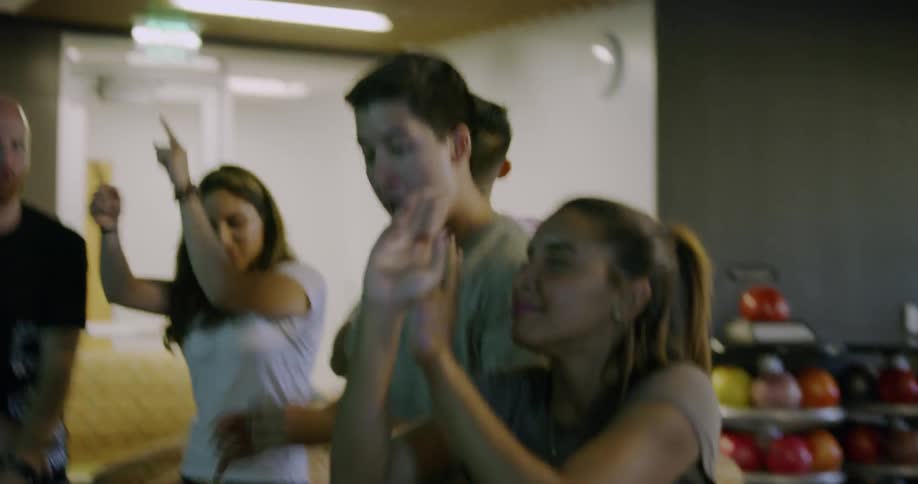 A group of people dancing together