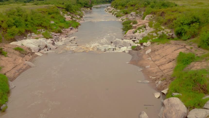A river flows through a rural area