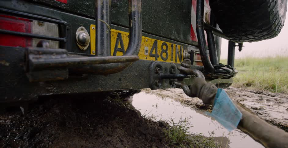 A tow rope is attached to a vehicle