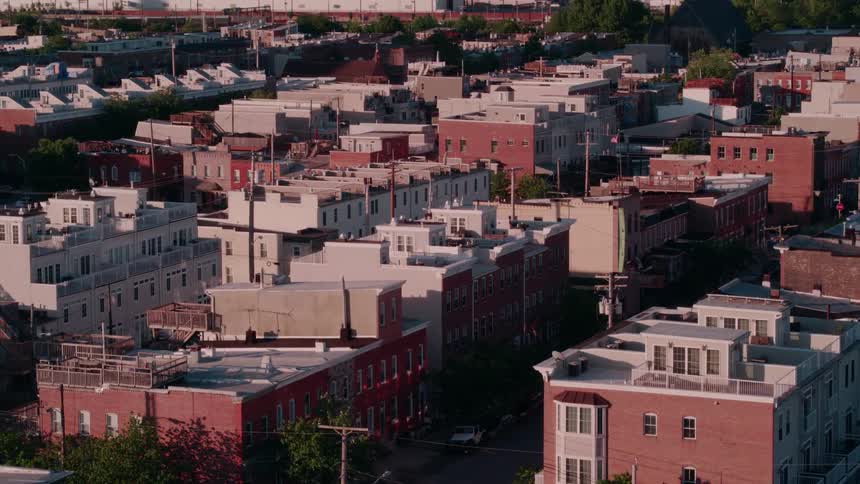 A drone is flying over a small town