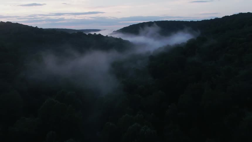 Fog is rolling over the valley ahead