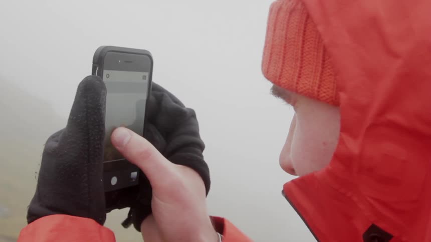 A person taking pictures