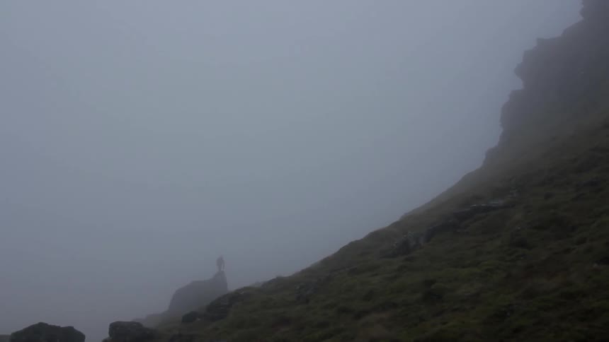 A foggy mountain side