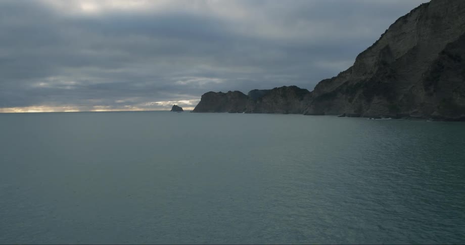 Clouds hover over the coast
