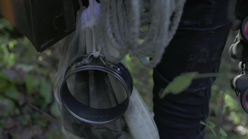 A bunch of items held by a stranger