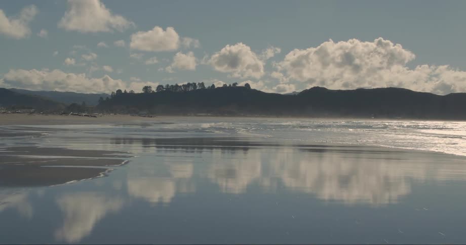 Smalls waves are crashing onto the beach