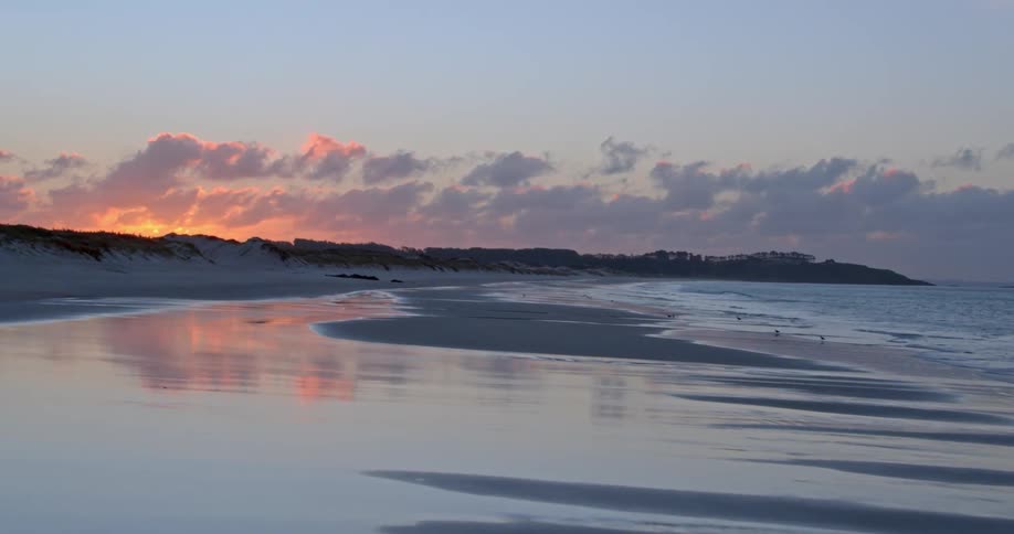 The beach is calm at dawn