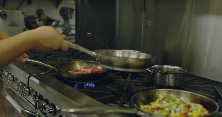 A chef cooking in a restaurant