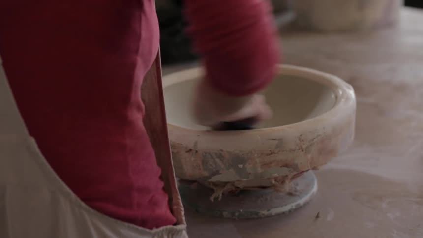 A person making pottery