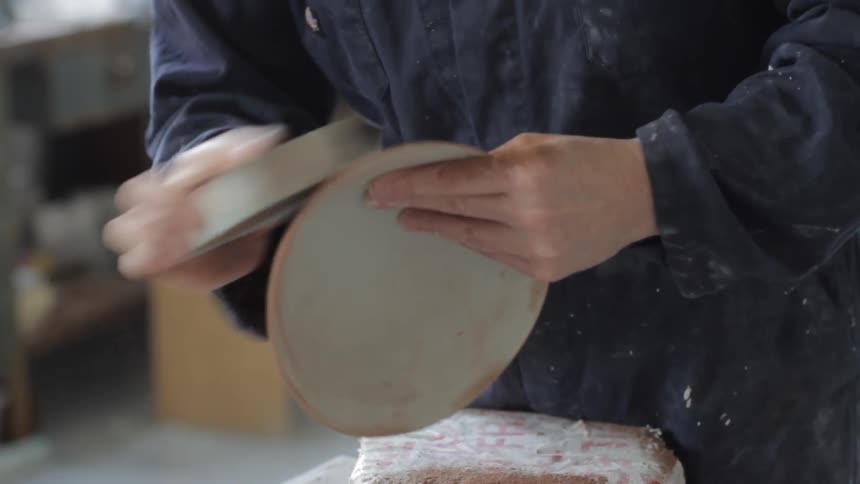 A person sanding something