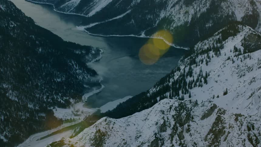 River flows through snowy mountains