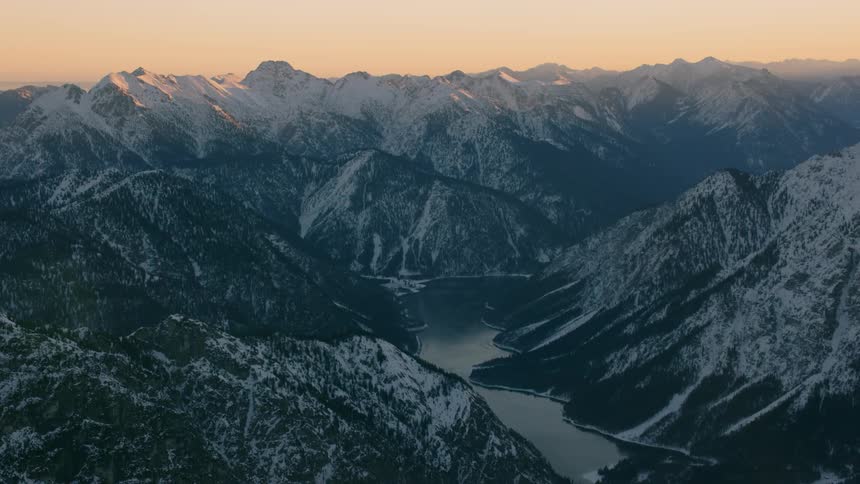Snow covers the mountain landscape