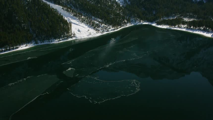 Ice floats on a mountain lake